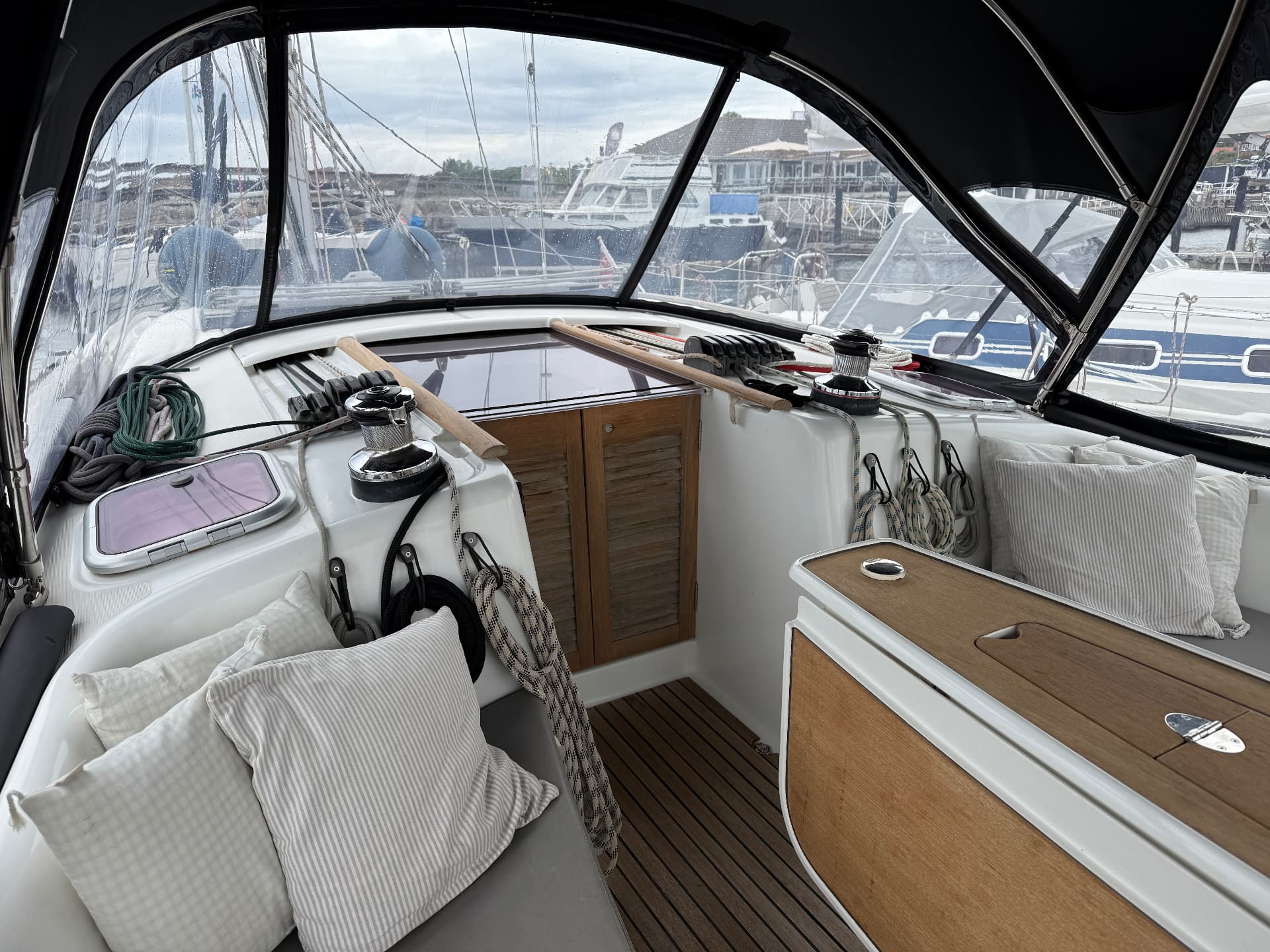Cockpit coamings, winches and companionway
