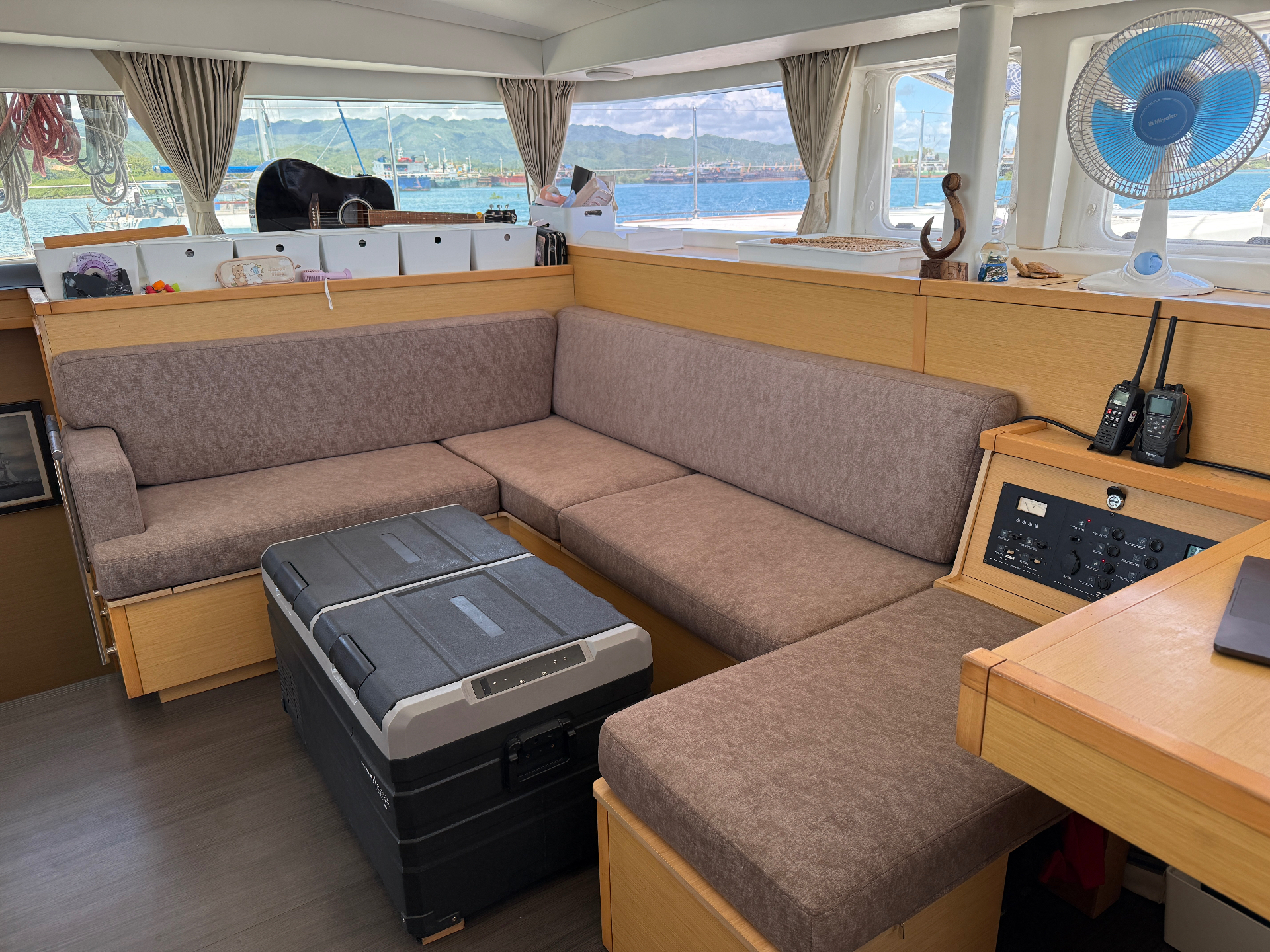 Bright saloon with panoramic windows and dining table