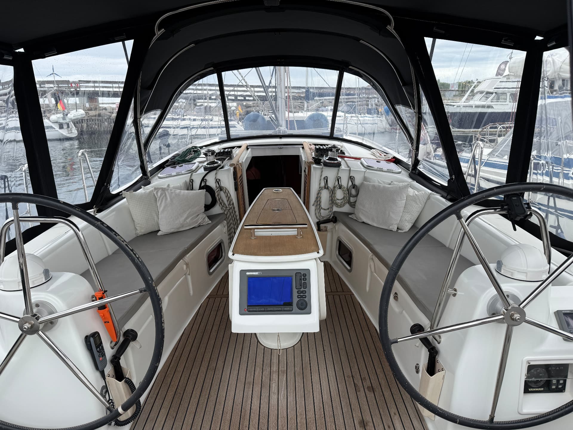 Cockpit seen from aft with twin wheels and cockpit tent