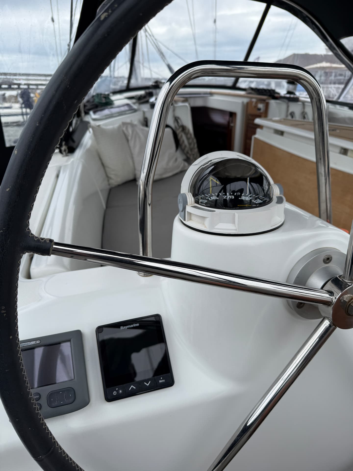 Helm station with compass and Raymarine instruments