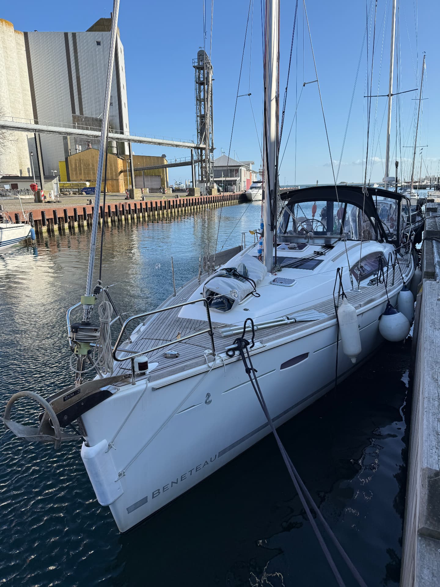 Topas alongside the quay with teak side deck and Rocna anchor