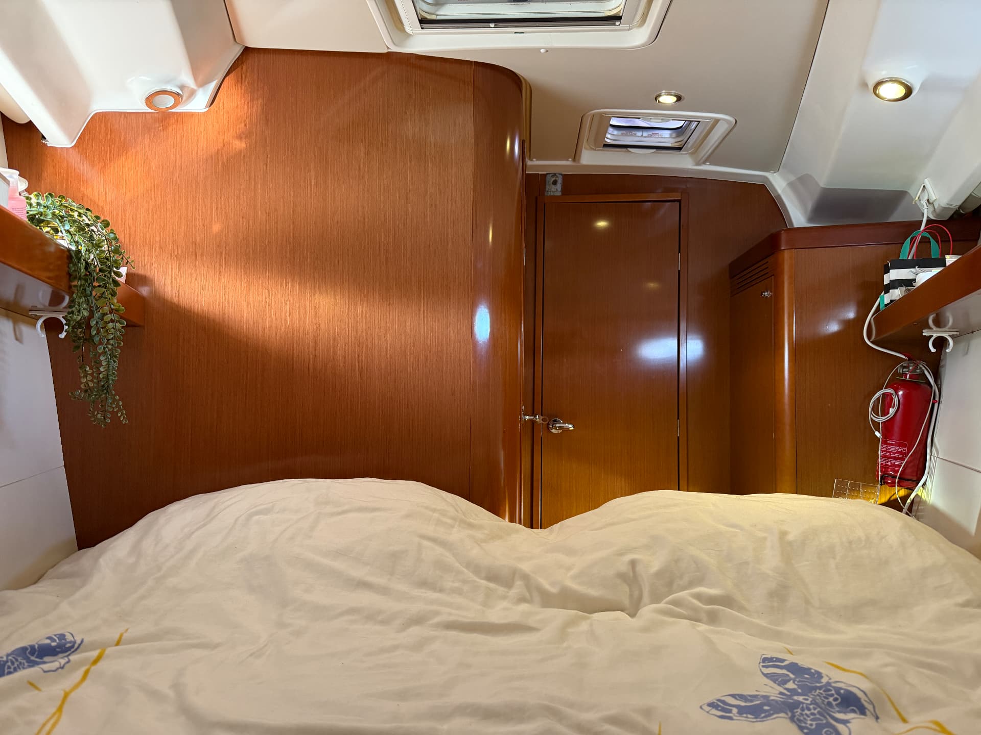 Forward cabin looking aft towards wardrobe and door